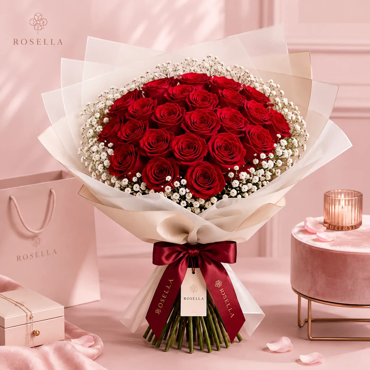Rosella Étoile premium red roses and baby's breath bouquet with small white flowers on the side